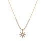 A crystal star shaped pendant on a gold chain with white pearls.